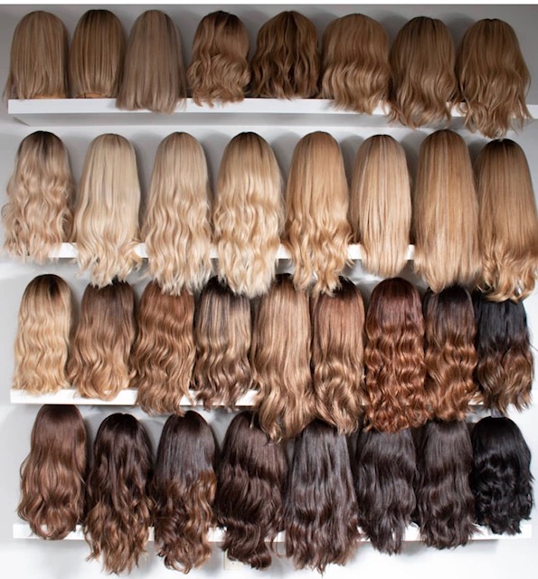 Custom coloured wigs on display